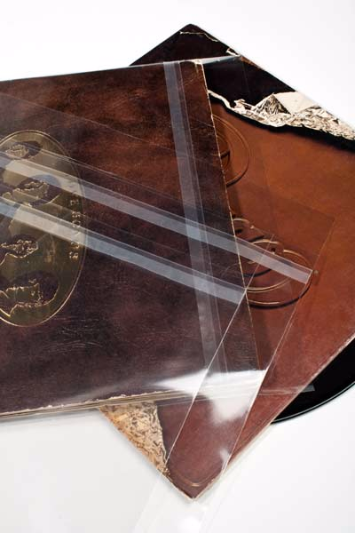 Crystal clear album sleeve with adhesive closure Crystal clear album sleeve with adhesive closure